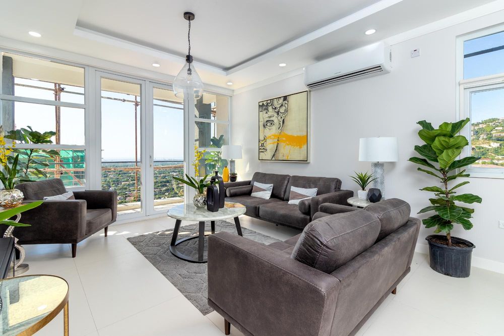 Living room of the Vitalia model residence with hillside views